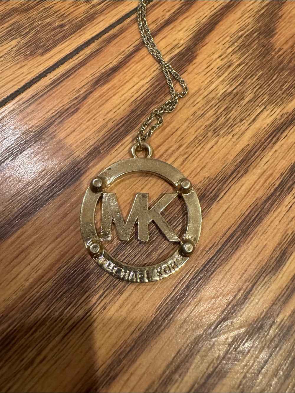 MK Michael Kors gold tone necklace
